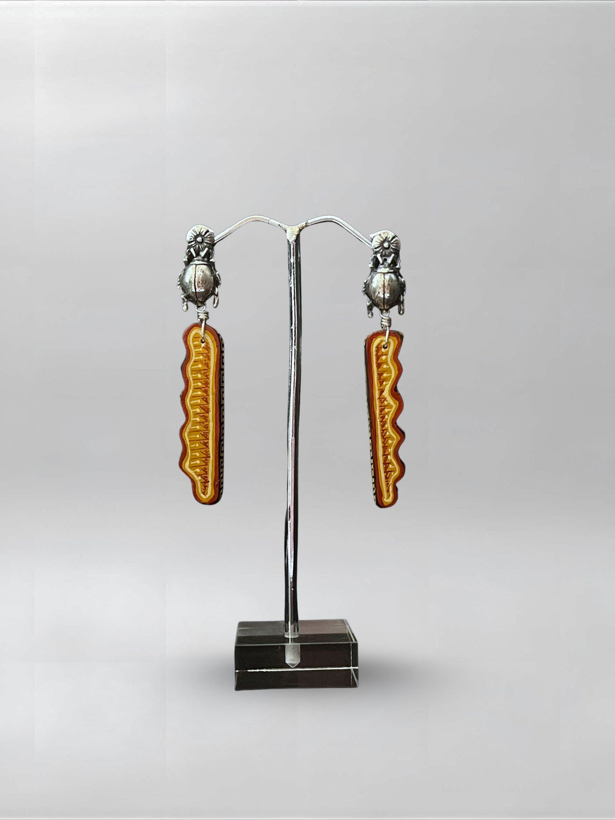 Bronze Line — one-of-one hand-carved wood and sterling silver earrings