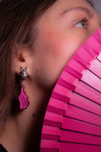 Detail of Pink Shell hand-carved wood and sterling silver earrings