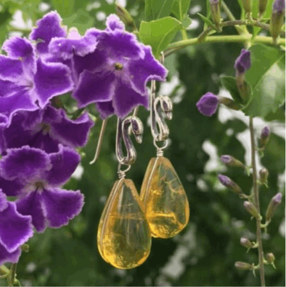 Detail of Amber Swan Earrings by Flora María